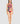 Woman wearing a colorful swimsuit with abstract design on a light gray background